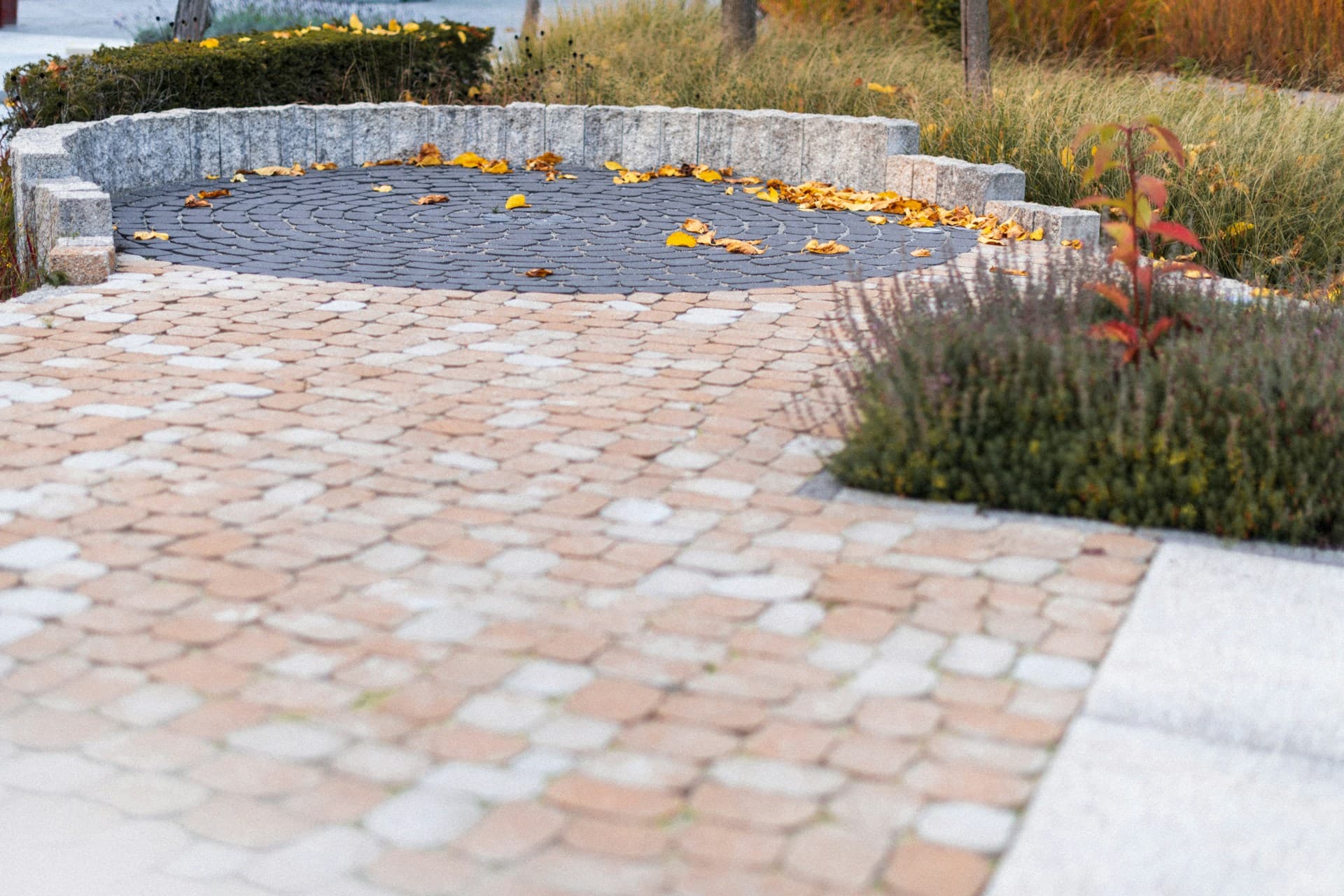 Landscaping — a paved courtyard with stone edging